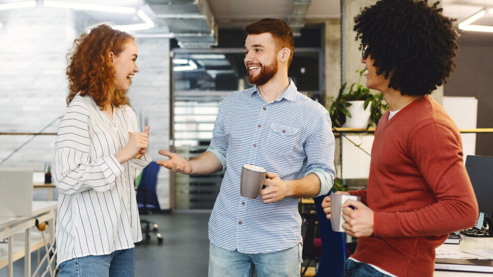 A group of people meeting together in an office space